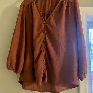 Mauve colored blouse